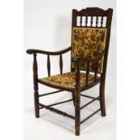 An Edwardian mahogany framed armchair, with upholstered back and seat,