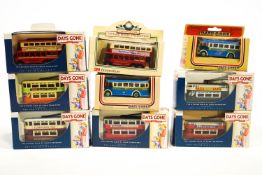 A boxed Corgi Super Greyhound MC-8 Americruiser with other boxed buses and trams,