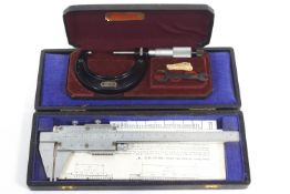A Rabone Chesterman Vermier caliper, cased, and a Starrett micrometer,