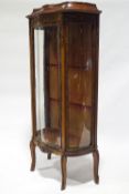 A Louis XVI style mahogany display cabinet with gilt metal mounts,