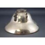 A silver inkwell, of flattened wide bell form, the flip up lid with a rope twist edge,