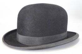 A bowler hat, the luxorite satin finish pure fur felt, retailed by Cleverley's of Coventry,