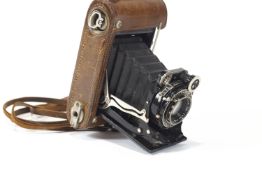A Zeiss lkon super lkonta folding camera, with Carl Zeiss Jenna lens
