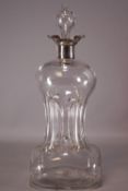 A silver mounted spirit decanter and stopper, with petal shaped mount,