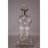 A silver mounted spirit decanter and stopper, with petal shaped mount,