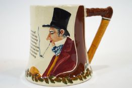 A Crown Devon pottery mug relief moulded and realistic polychrome decorated with John Peel in