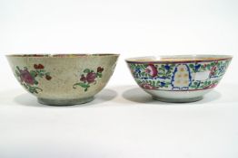 A Chinese porcelain punch bowl of small form decorated with polychrome floral panes, 8cm high,