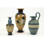 A Doulton Lambeth vase, 30cm high, and a smaller Doulton Lambeth vase,