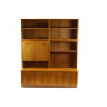 A G-plan teak side cabinet with three open shelves to one side and two to the other,
