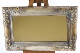 A late 20th/21st century rectangular wall mirror with carved wood frame in 19th century style,