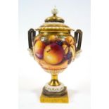 A Royal Worcester two handled vase and cover, painted in polychrome enamels with fruit by T Nutt,