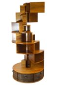 A late 20th/early 21st century 'Touchwood' mahogany spiral display stand,