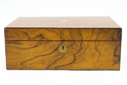 A Victorian walnut rectangular work box, the hinged cover inlaid with brass medallion,
