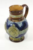 A Doulton Lambeth stoneware Victoria diamond jubilee jug, with a scroll handle and two bands,