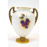 A Royal Worcester two handled vase, painted in polychrome enamels with fruits by H Ayrton, signed,