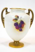 A Royal Worcester two handled vase, painted in polychrome enamels with fruits by H Ayrton, signed,