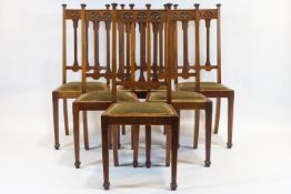 A set of six mahogany Art Nouveau dining chairs,