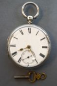 An unbranded open face pocket watch. Key wound movement with key supplied. Inscription to reverse.