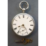 An unbranded open face pocket watch. Key wound movement with key supplied. Inscription to reverse.