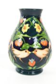 A Moorcroft William Morris 'Strawberry Thief' pattern oriform vase, circa 1995,