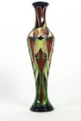 A Moorcroft 'Trinity' pattern slender inverted baluster form vase, designed by Philip GIbson,