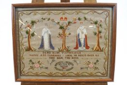 A Coronation needlework sampler, depicting George V and Queen Mary,