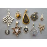 A collection of ten pendants of variable designs, most marked for sterling silver 925.