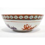 A Japanese porcelain bowl, painted in enamels with koi carp,