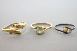 A collection of three dress rings. One stamped 9K, one stamped 585.