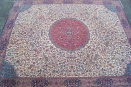 A large Edwardian style carpet, with central medallion,