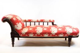 A mahogany and oak framed chaise longue, with turned baluster gallery, on turned feet,