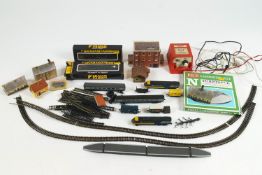 Two Graham Farish locomotives with some boxed Farish 0021 and 0031 track and other items