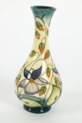A Moorcroft, 'Violets pattern' One Star member piece of bottle form, circa January 2000,