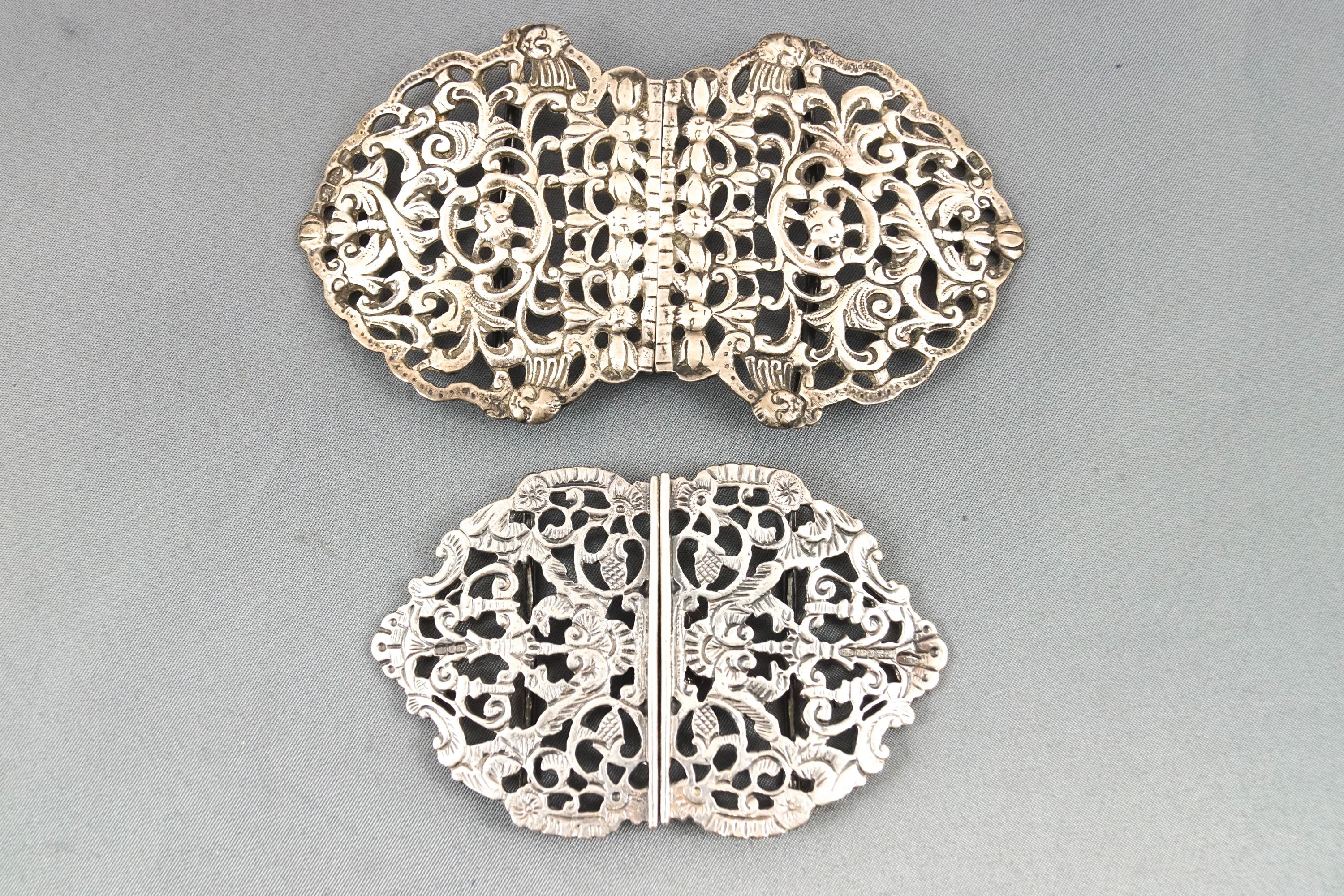 A cast and chased silver openwork belt buckle in the scrolling foliate baroque style, Chester 1894,