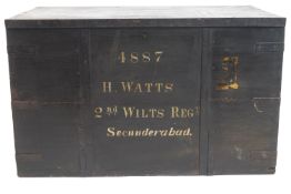 A regimental wooden black painted chest, with two iron handles,