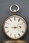 An unbranded full hunter pocket watch.