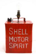 A Shell motor spirit oil can, of rectangular section, adapted as a lamp base,