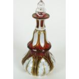 A Bohemian overlay ruby and white decanter and a stopper, mid 19th century,