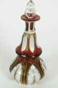 A Bohemian overlay ruby and white decanter and a stopper, mid 19th century,