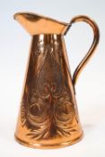 A copper jug by Beldray, the tapering cylindrical body decorated with Art Nouveau motifs, stamped,