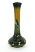 A Moorcroft 'Phoenix Bird' pattern bottle shaped vase, designed by Rachel Bishop, circa 1998,