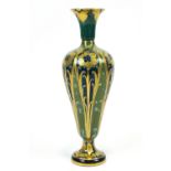 William Moorcroft for Macintyre, a green and gold 'Florian ware' inverted baluster vase,