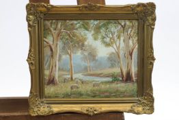 N Woodley, 'Blue Gums', An Australian landscape, oil on board within giltwood frame,