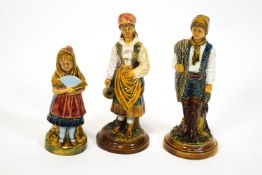 Three Victorian continental majolica style figures, each with impressed pattern numbers,