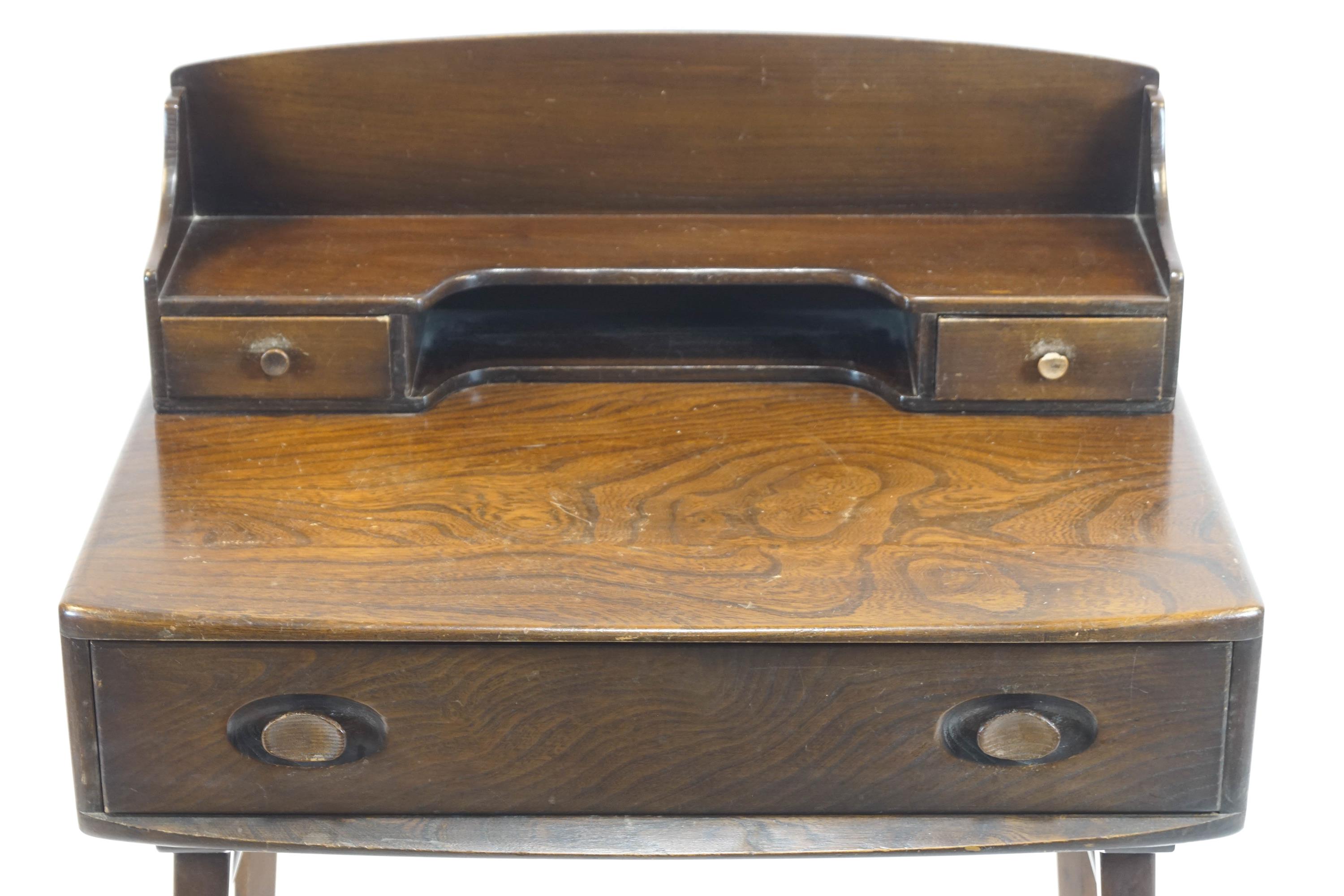 An Ercol elm desk the raised back with two drawers above one long drawer, on square tapering legs, - Image 3 of 3
