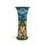 A Moorcroft 'Himalayan blue poppy' vase, of concave cylindrical form, signed and dated to base,