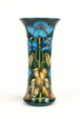 A Moorcroft 'Himalayan blue poppy' vase, of concave cylindrical form, signed and dated to base,