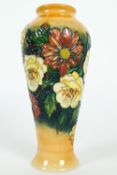 A Moorcroft 'Victoriana' pattern orange ground vase, circa 1997, by Emma Bossons,