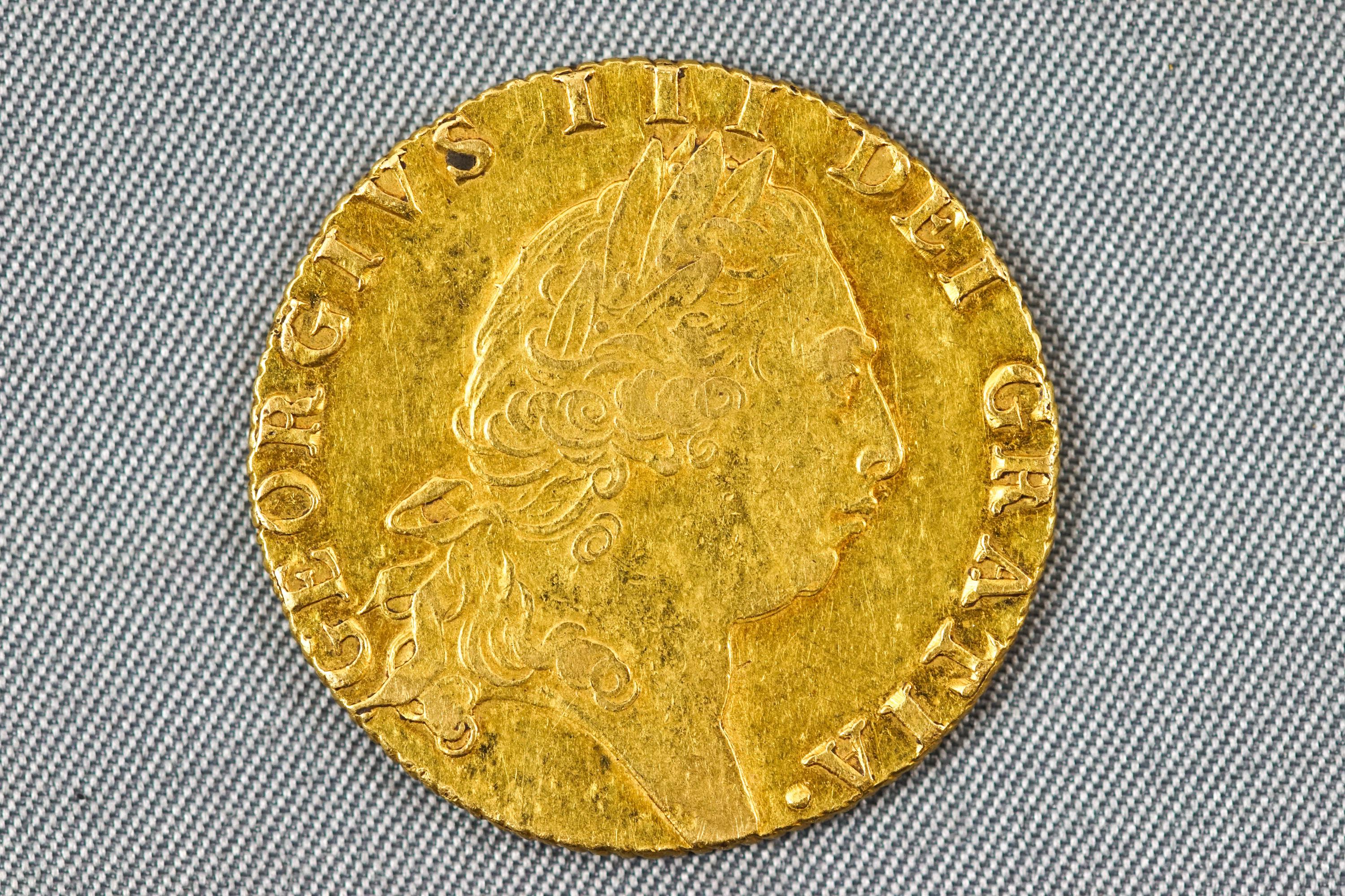 A loose George III shield sovereign, dated 1794.