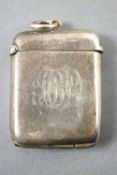 A silver vesta of plain, flat rounded rectangular form, Birmingham 1909